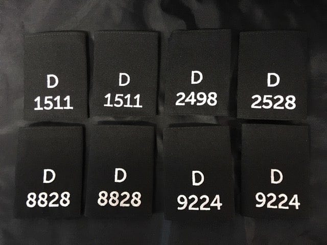 Police Surplus Police Uniform 9cm Epaulette Slides, black with white embroidered letter D and mixed numbers, 9cm length (Used – Grade A)