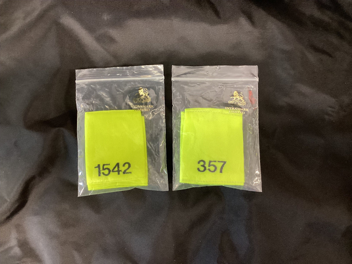 Police Surplus Police Uniform Epaulette Slides, Hi Vis yellow, black embroidered mixed numbers and lengths (Used – Grade A)