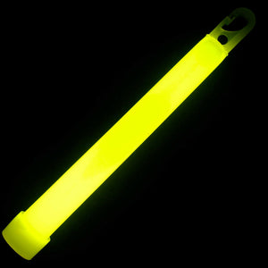 Yellow 6 inch chemical glow stick providing illumination in darkness
