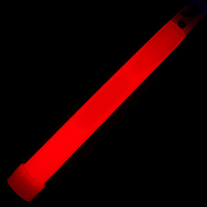 Red 6 inch tactical light stick glowing against a black background