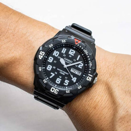 Casio MRW-200H-1BVES black analogue wristwatch worn on wrist showing sporty design and easy-to-read dial
