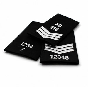 Custom embroidered black rank slide with white stitched numbers and rank markings