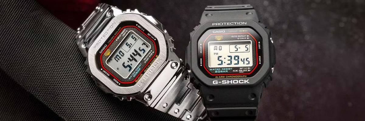G-SHOCK black and metal watches on a dark background