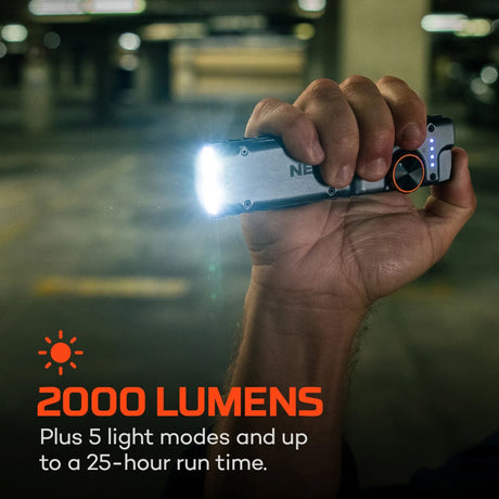 NEBO 2000 lumen flashlight in use showing its powerful LED beam