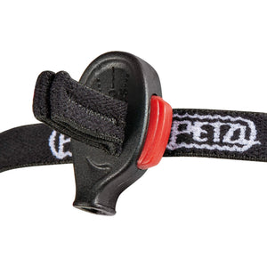 Side view of Petzl e+LITE headtorch showing adjustable light housing and red detailing