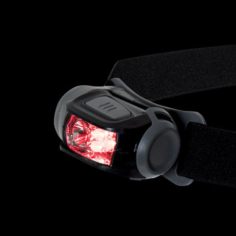 Rothco Black Cree LED Headtorch showing illuminated red LED light mode for low-light use