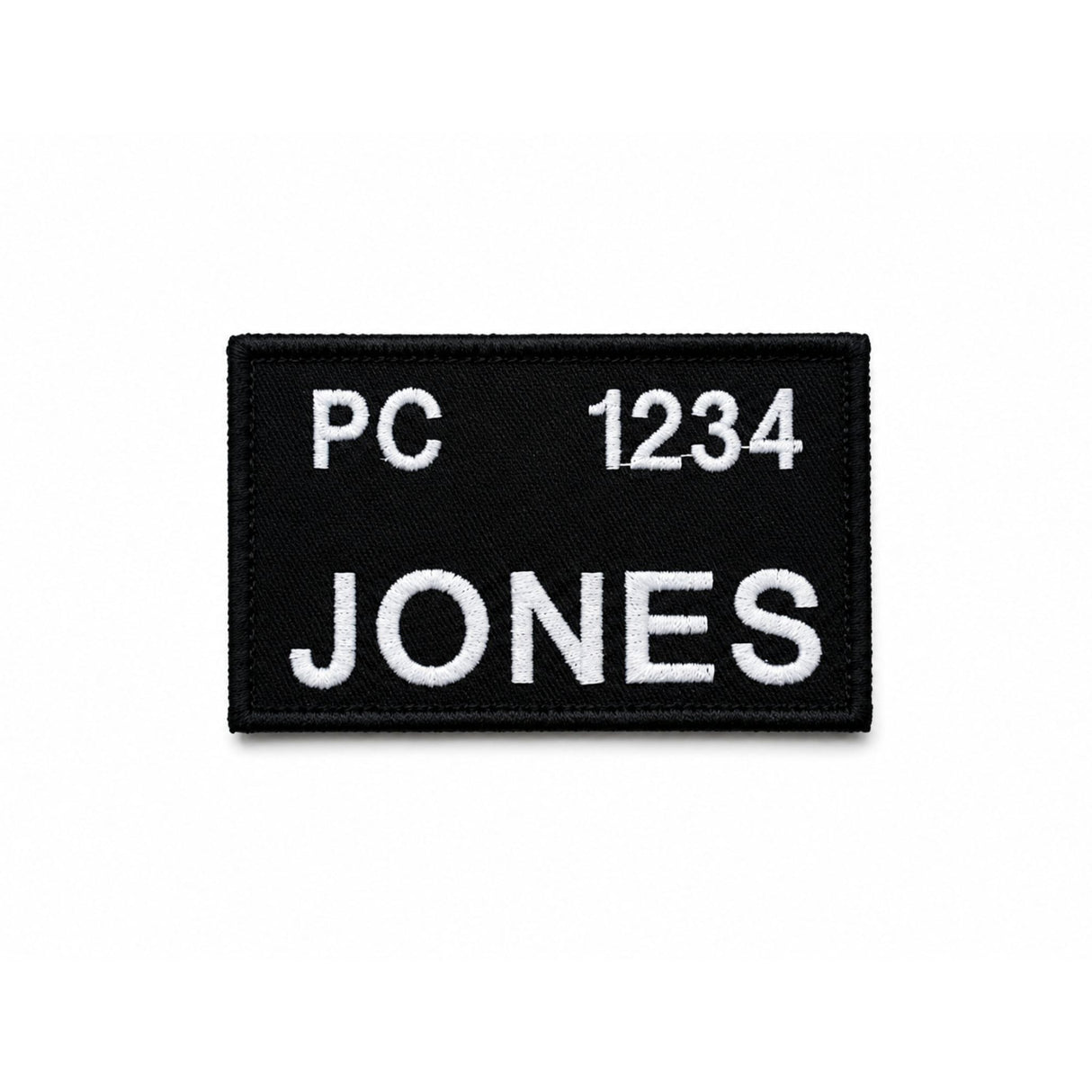 Embroidered uniform name badge with hook and loop backing