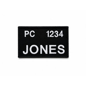 Embroidered uniform name badge with hook and loop backing