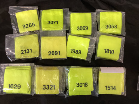 Police Surplus Police Uniform Epaulette Slides, Hi Vis yellow, black embroidered mixed numbers and lengths (Used – Grade A)